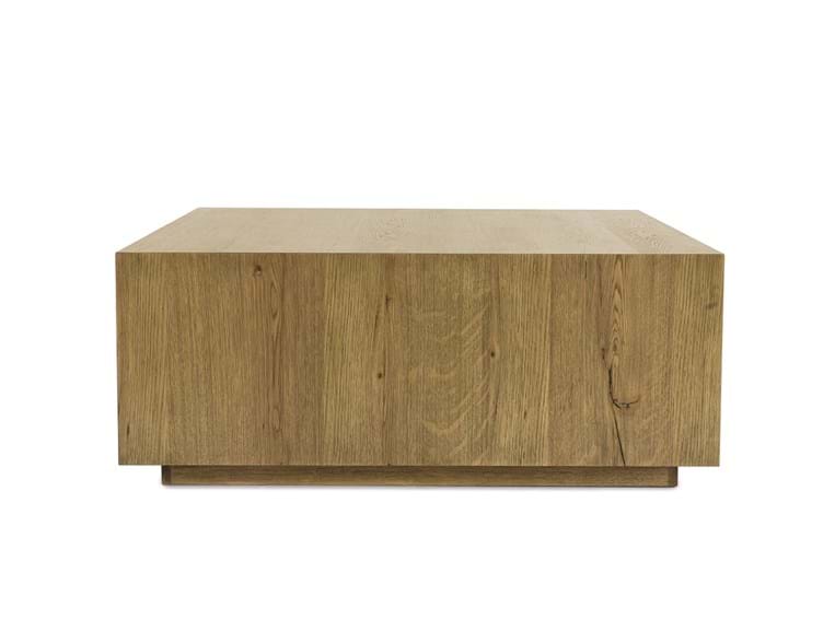 Square light brown coffee table.