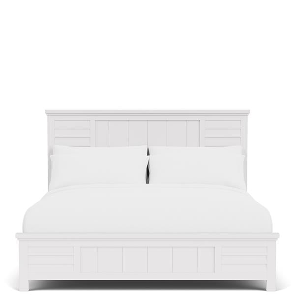 All white bedroom with white bed frame and bedding.