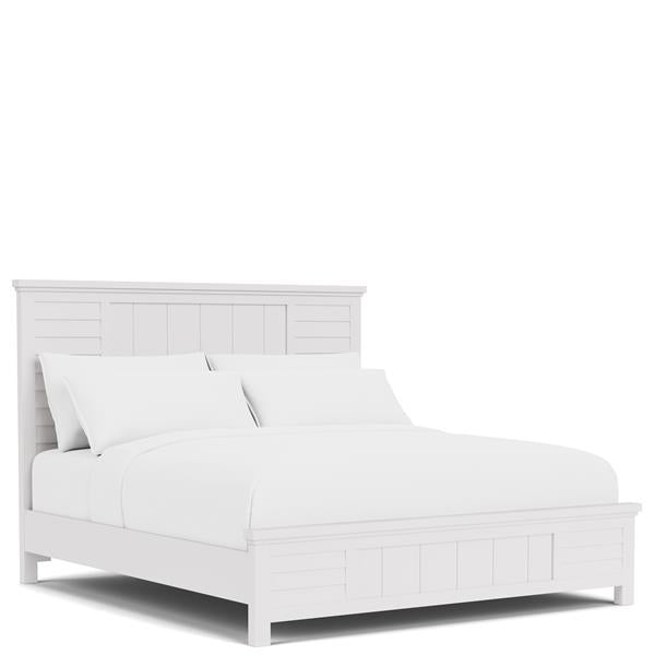 Diagonal white wooden bed frame with white bedding.