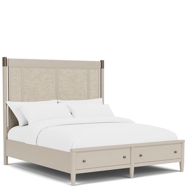Diagonal cream-colored bed frame with bronze accents.