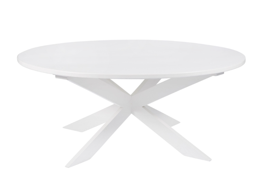 Round white dining table with double X legs.