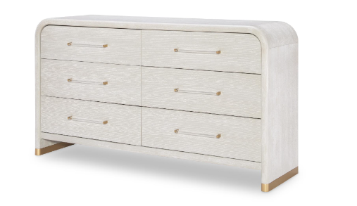 Six drawer rounded top cream dresser with silver pulls.