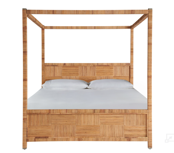 Front of brown canopy bed with contrasting grain detail.