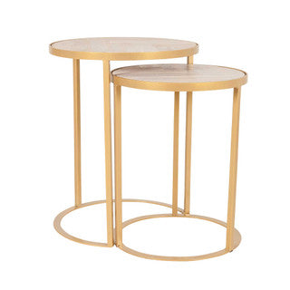 Two intersecting gold side tables.