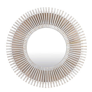 Round wall mirror with ivory details.