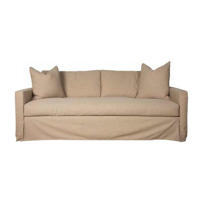 Front of sand-colored loose two cushion couch.