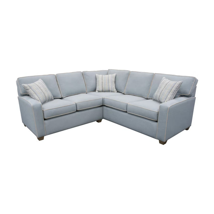 Front angled view of small light blue and white sectional.