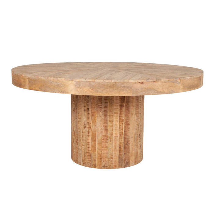 Large round light brown dining table with cork bottom.