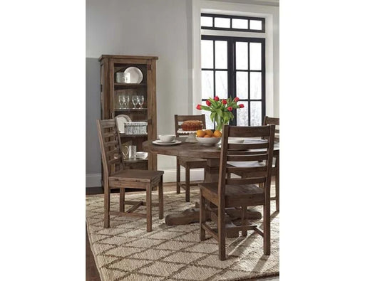 Natural round brown dining room furniture set with four chairs.