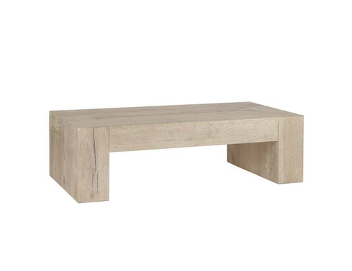 Rectangular low sand-colored coffee table.