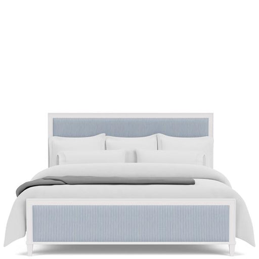 Front of white and textured blue headboard.