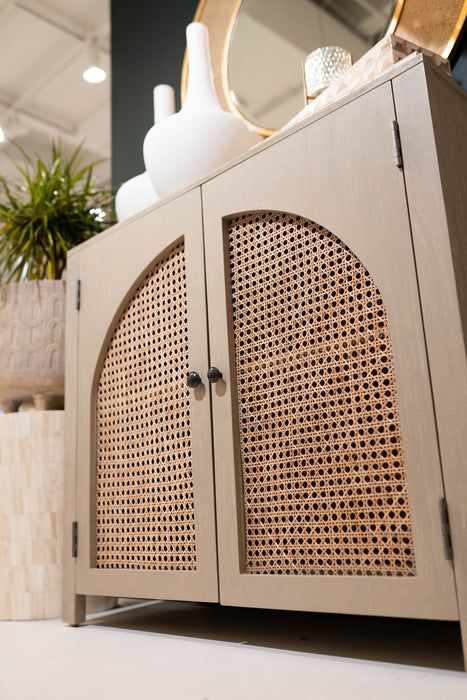 Brown two door storage cabinet with mesh front.