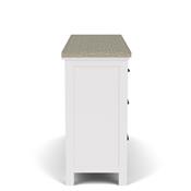 Side of white dresser with marble countertop.