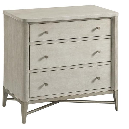 Large cream colored side table with three drawers.