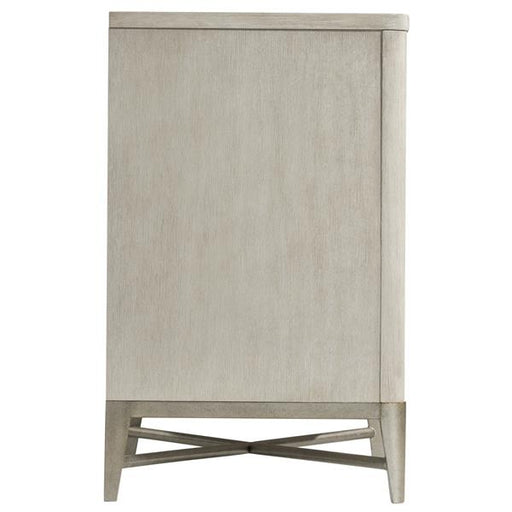 Side view of large cream colored side table.