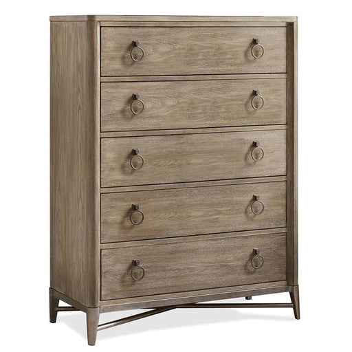 Angled view of medium brown five drawer dresser with gold pulls.