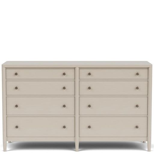 Front of cream colored eight drawer dresser with copper pulls.