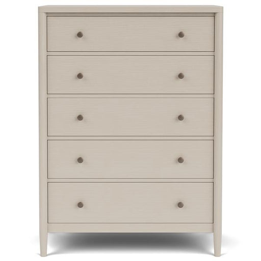Front of cream five drawer dresser with round copper pulls.