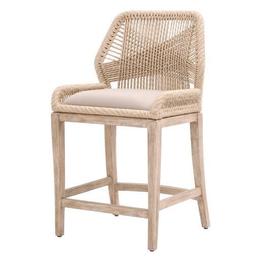 Sand-colored reinforced loom counter stool.
