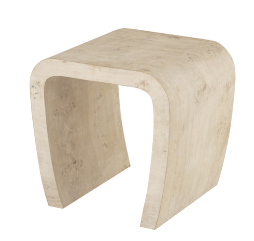 Cream-colored arched side table.