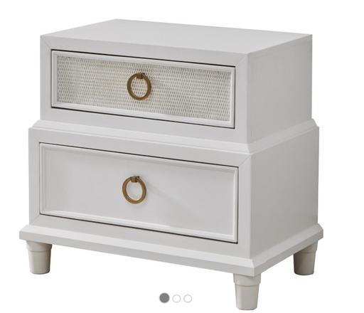 Small cream accent table with round bronze drawer pulls.