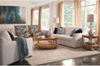 Neutral gray and blue sectionals for any coastal living room.