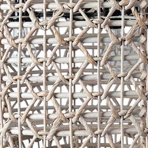 Close up of white woven wicker detail.