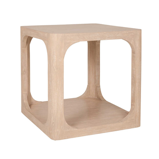 Angled sand-colored open center side table.