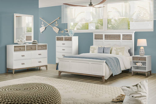 Sea winds and kauai white bedroom with brown rattan accents.