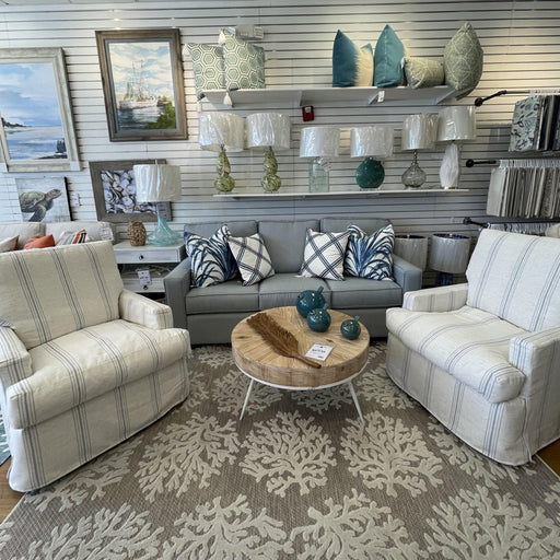 Striped Smyrna gliders in showroom.