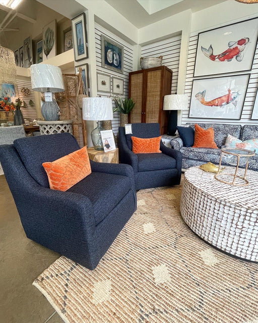 Coastal living room set featuring luxury wallcovering options.