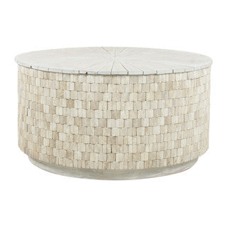 Round cream and white stone coffee table.