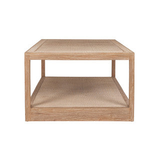 Small sand-colored coffee table.