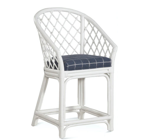 White criss-cross accent chair with blue cushion.