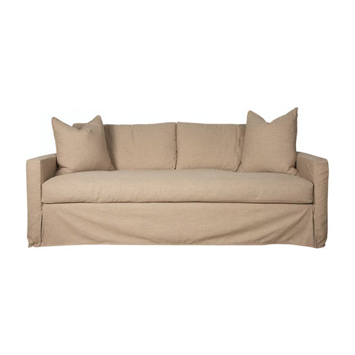 Front of sand-colored loose two cushion couch.