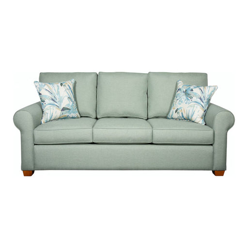 Front of sage green three cushion sofa.